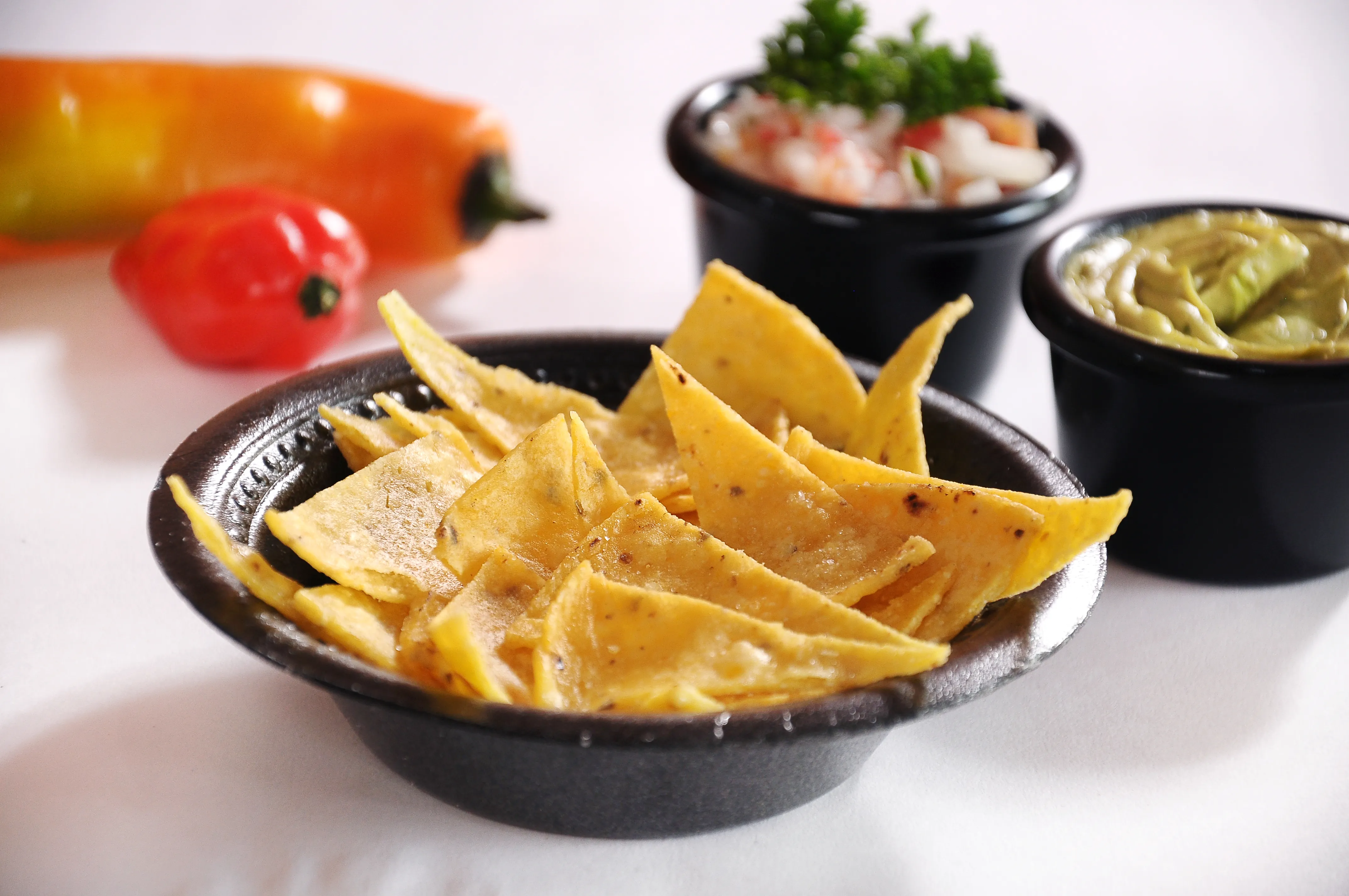 Chef Drizzling Olive Oil Paella Pan Kitchen Houston - Food & Product Photography in Houston Texas