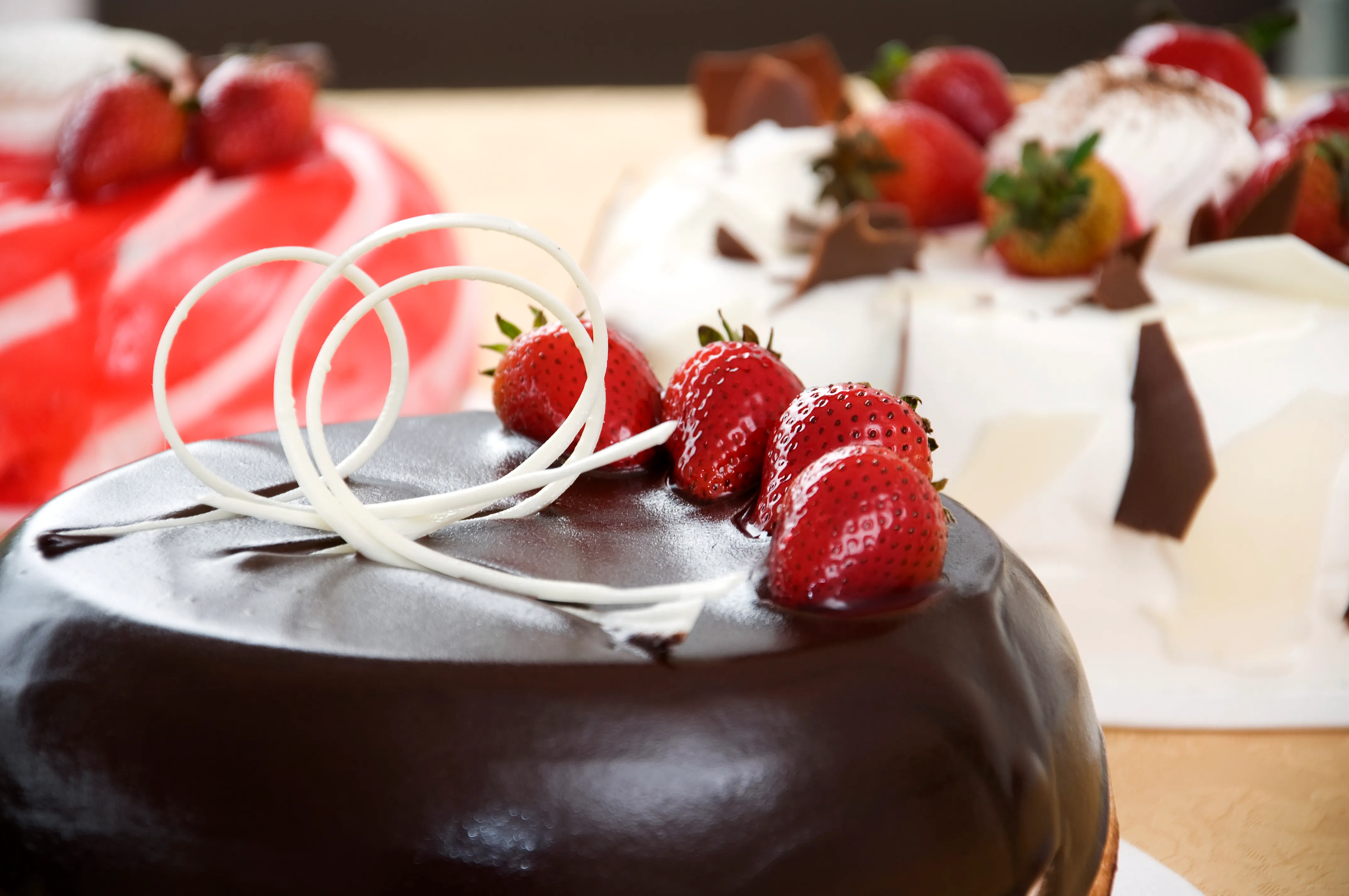 Chocolate Glazed Cakes Strawberries Dessert Display Houston - Food & Product Photography in Houston Texas