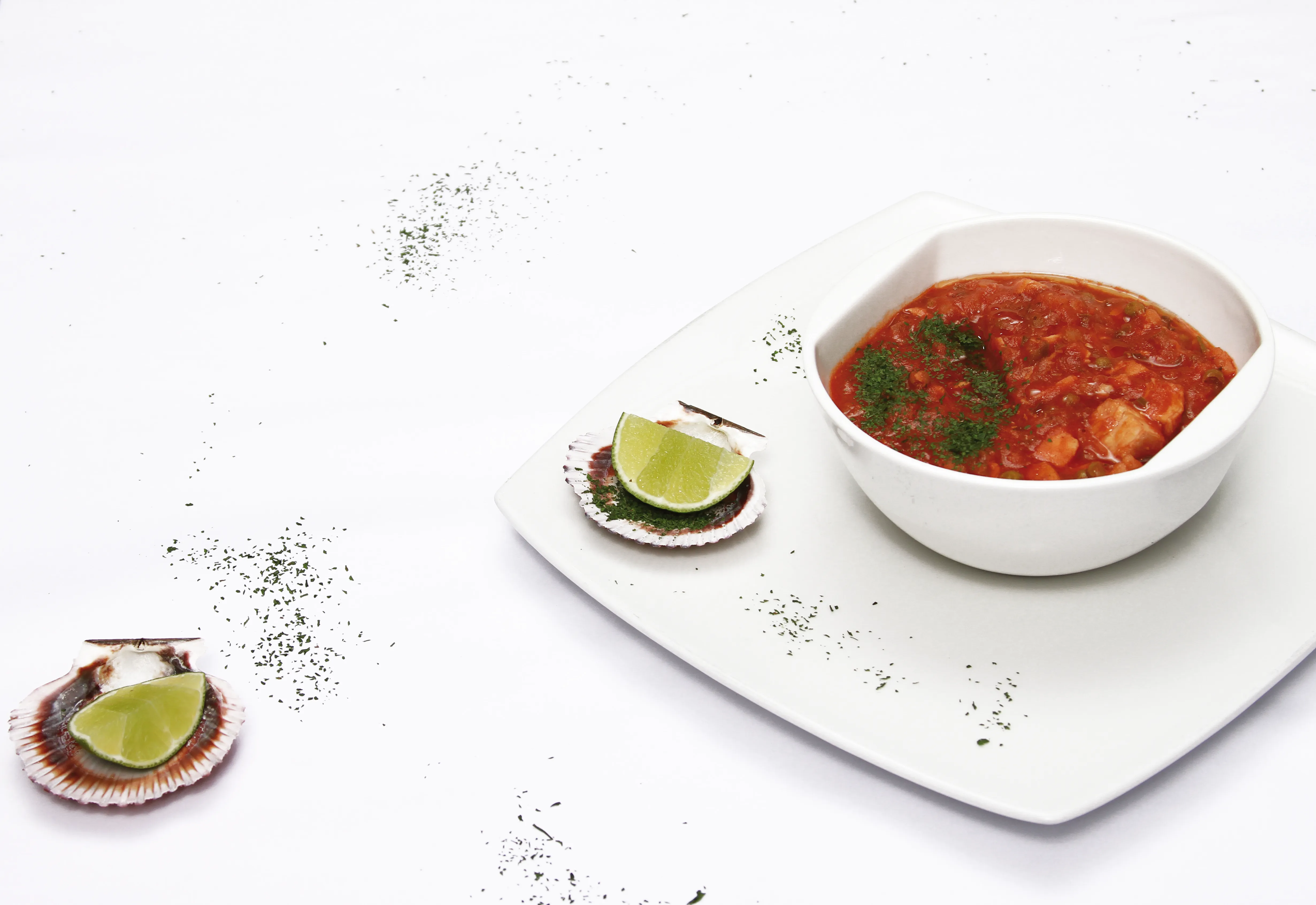 Seafood Tomato Stew White Bowl Lime Scallop Shell Houston - Food & Product Photography in Houston Texas
