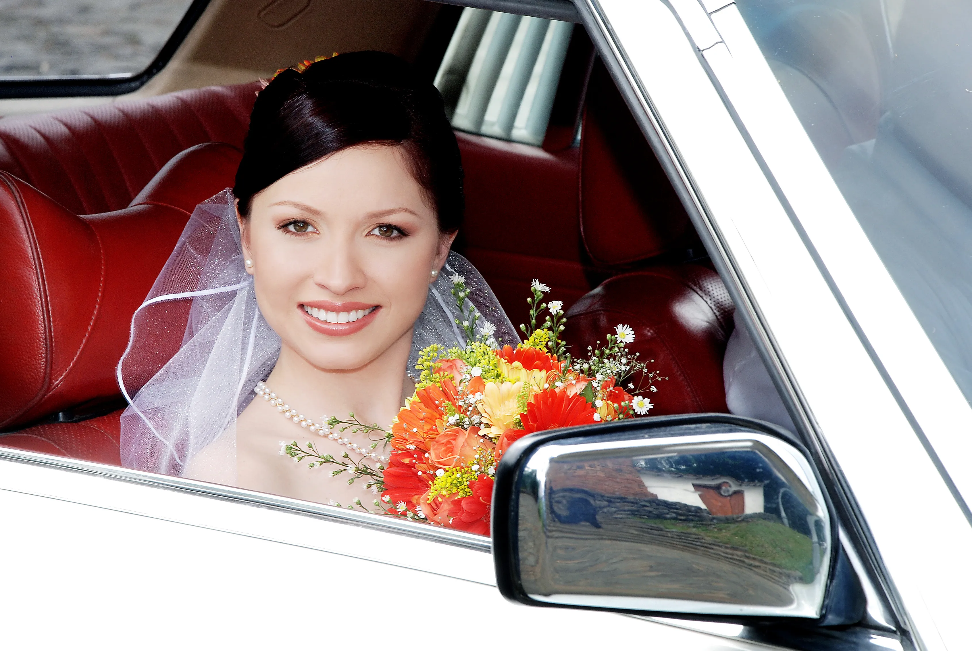 Wedding Bride Smiling Car Orange Red Bouquet Houston - Wedding Photography in Houston Texas