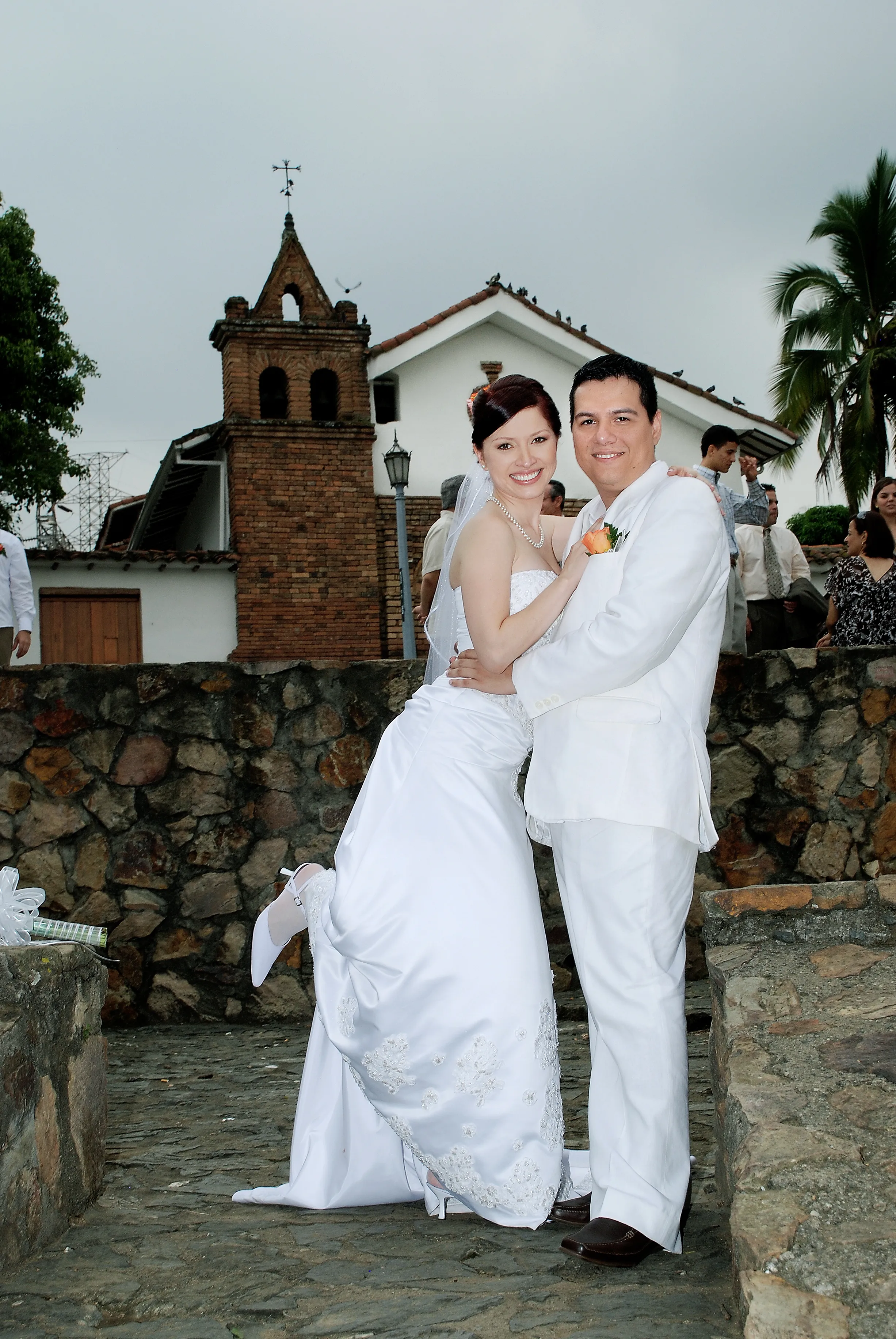 Wedding Couple Outdoor Colonial Church Stone Wall Houston - Wedding Photography in Houston Texas